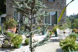 Zahrada ubytování Chambre Bounty, B&B, cuisine privée, lit queen size, terrasse, parking, garage
