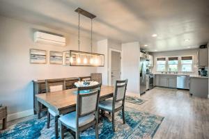 a dining room and kitchen with a table and chairs at Coastal Getaway by Pebble Beach and Redwoods! in Crescent City