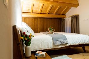 Ένα ή περισσότερα κρεβάτια σε δωμάτιο στο Antico Borgo Brunelli