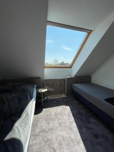 Ένα ή περισσότερα κρεβάτια σε δωμάτιο στο Wohnen auf Zeit, Boardinghouse-Oelde, Ost, West