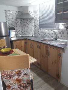 Apartamento Trini tesisinde mutfak veya mini mutfak