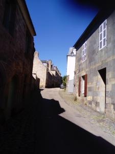 an empty street in an old stone building at TY KOANT in Daoulas