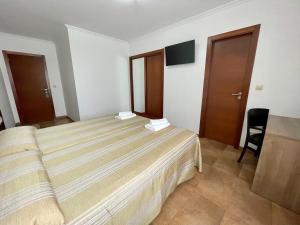 Posteľ alebo postele v izbe v ubytovaní Hostal Eden