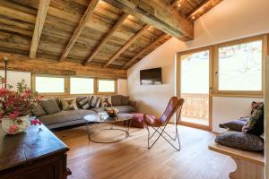 TV a/nebo společenská místnost v ubytování Chalet Marmotta NEVE - Luxus Chalet Ski-In Ski-Out