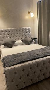 Łóżko lub łóżka w pokoju w obiekcie Hotel Boutique Andalucia