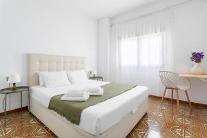 Posteľ alebo postele v izbe v ubytovaní CASA MILA SV guesthouse