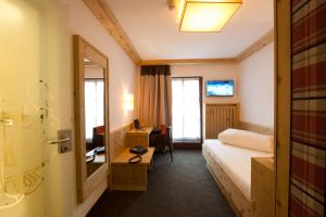 Postel nebo postele na pokoji v ubytování Hotel Bierwirt