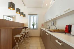 Kuchyň nebo kuchyňský kout v ubytování Ta Gianni Guest House + 7 fotografií