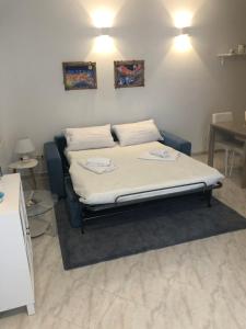 Posteľ alebo postele v izbe v ubytovaní Riomaggiore Apartment cà di Euro