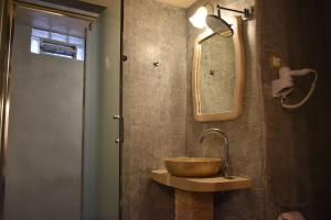 Koupelna v ubytování Odos Oneiron Boutique Hotel