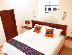 Posteľ alebo postele v izbe v ubytovaní Hostal Las Puertas
