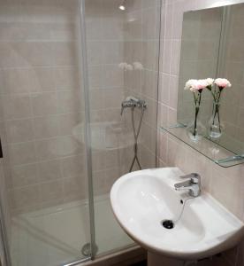a bathroom with a sink and a shower at Bonus Dei - 5934 in Isla +25 photos