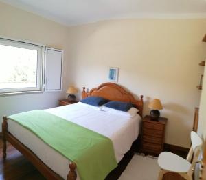 Uma cama ou camas num quarto em Casas d'Almofala