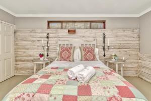 Katil atau katil-katil dalam bilik di Old Sam's Cottage