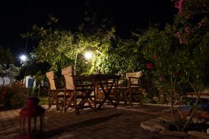 A garden outside Koukouapartments & Suites