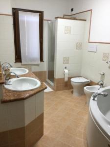 Koupelna v ubytování B&B Corte Sant'Angelo + 37 fotografií