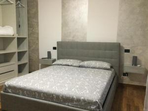 Postel nebo postele na pokoji v ubytování B&B Corte Sant'Angelo