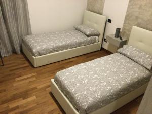 Postel nebo postele na pokoji v ubytování B&B Corte Sant'Angelo