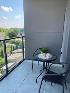 Balkon lub taras w obiekcie Royal Manu Apartment NETFLIX