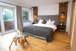 Posteľ alebo postele v izbe v ubytovaní Hotel Macun, Vent im Ötztal + 37 fotografií