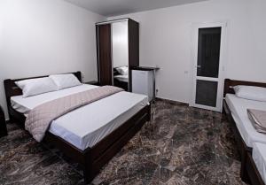Letto o letti in una camera di Agata Breeze