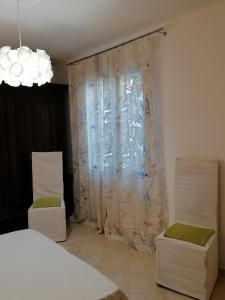 Łóżko lub łóżka w pokoju w obiekcie Suite Maria