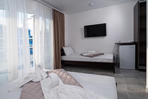 Letto o letti in una camera di Agata Breeze