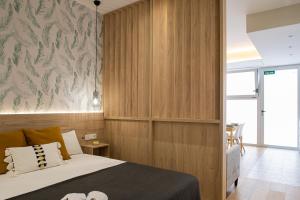 Postel nebo postele na pokoji v ubytování FLORIT FLATS - Valencia Port Rooms II