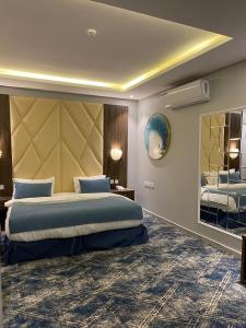 Katil atau katil-katil dalam bilik di فندق ايديا