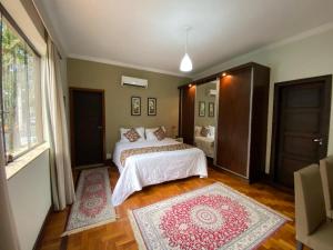 Postel nebo postele na pokoji v ubytování Princesa Isabel Pousada e Hotel – Dom Pedro