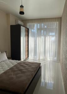 Postel nebo postele na pokoji v ubytování Horizons Hotel Rooms