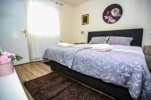 Posteľ alebo postele v izbe v ubytovaní Apartman Veronika