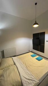 Posteľ alebo postele v izbe v ubytovaní DarkHouse2 + 8 fotografií
