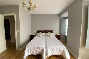 Łóżko lub łóżka w pokoju w obiekcie El Taller de Doña Remedios