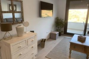 TV a/nebo společenská místnost v ubytování Apartamento en Tarifa Viento de Tramontana