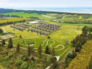 an aerial view of a park with a horse track at 6 person holiday home on a holiday park in Hanstholm in Hanstholm