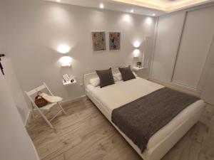 Ένα ή περισσότερα κρεβάτια σε δωμάτιο στο Rual Centro apartamento