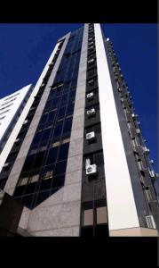 a tall building with cars on the side of it at apartamento otima localizacao itaim bibi in Sao Paulo