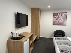Risdon Brook Hotel客房内的一张或多张床位