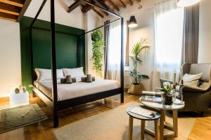 Ένα ή περισσότερα κρεβάτια σε δωμάτιο στο Castelmenardo39