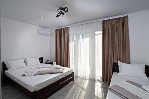 Letto o letti in una camera di Agata Breeze