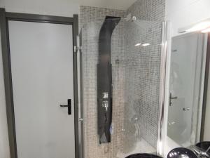 Kúpeľňa v ubytovaní Ilga Hotel
