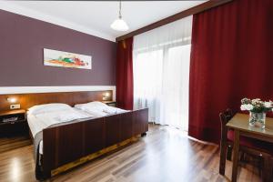 Postelja oz. postelje v sobi nastanitve Hotel Hoffinger