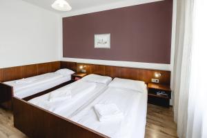 Postelja oz. postelje v sobi nastanitve Hotel Hoffinger