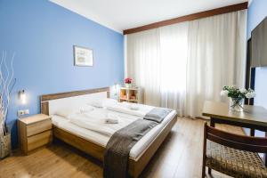 Postelja oz. postelje v sobi nastanitve Hotel Hoffinger