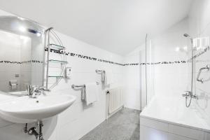 Kopalnica v nastanitvi Hotel Hoffinger