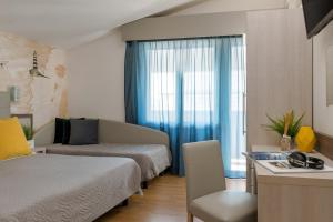 Postel nebo postele na pokoji v ubytování Hotel Sole