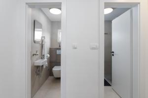 Kúpeľňa v ubytovaní Ampelea apartment + 21 fotografií