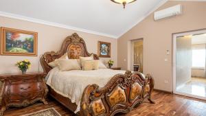 Postel nebo postele na pokoji v ubytování Apartments Villa BV