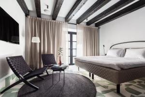 Posteľ alebo postele v izbe v ubytovaní Concepcio by Nobis, Palma, a Member of Design Hotels
